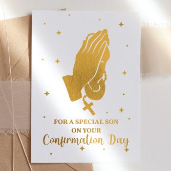 Make this sacred milestone truly unforgettable with our personalised First Holy Communion card, featuring a beautiful boy silhouette holding his prayer book with exquisite foil detailing that catches the light.

Fully Personalised: Customised with the child's name and communion date, making it a treasured keepsake they'll cherish forever
Unique &amp; High-Quality: This isn't your average card. It's professionally printed on thick, premium paper for a standout look and feel
Symbolic Design: Features an elegant silhouette of a boy in his communion suit holding a prayer book, filled with a magical starry pattern in gorgeous foil, representing faith, devotion, and divine blessing
The Perfect Fit: Available in A6 (10.5 cm x 14.8 cm / 4.1 in x 5.8 in) and A5 (14.8 cm x 21 cm / 5.8 in x 8.3 in) sizes - easy to mail and fits perfectly into standard envelopes
Your Personal Touch: With a blank inside, you have plenty of room to write a personal, heartfelt message that makes this special day extra memorable
Support Small Business: Your purchase helps an independent creator, making it a gift that gives back. All our cards are made in Ireland, in our small home studio
Kraft Envelope Included: Each card comes with a beautiful kraft envelope


Available in stunning foil colours including turquoise blue, gold, rose gold, and silver. The sparkling celestial pattern creates a reverent, magical look perfect for this holy occasion.