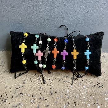 Adjustable cross bracelet.