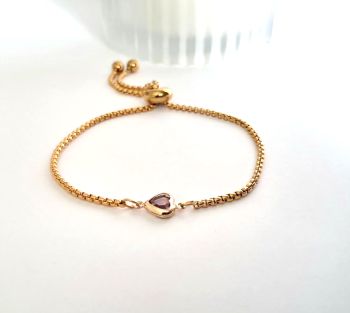 A beautiful heart bracelet, made in Ireland with quality materials.&nbsp; an adjustable stainless steel bracelet in gold, with a gorgeous pink glass heart centre.&nbsp; Perfect for gifting, for birthdays, anniversaries or valentines day... or a lovely treat for yourself!&nbsp; It arrives in a pretty velvet pouch and has&nbsp;free shipping!