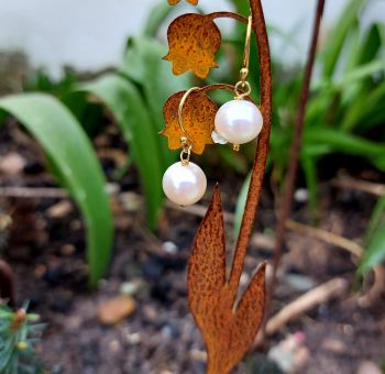 Handmade earrings with a 9mm natural Freshwater Pearl. The Pearl drops from Gold plated Sterling Silver earwires.&nbsp;
