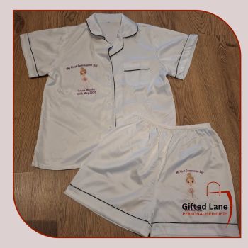 Personalised First Holy Communion Satin Pyjamas is a personalised gift and a keepsake of a special day. They are available in white satin with black piping or pearl white satin with black piping and can be&nbsp; personalised on both sides with any picture or text on them and with a date or name on them. Another special personalised gift from Gifted Lane.