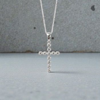 Sparkling Sterling Silver Cross Necklace&nbsp;
Gems:Clear Cubic ZirconiaMetal Material: Sterling Silver
Pendant Size: 27.73mm x 14.58mm
Gift Ideas for Christening, Communion, Confirmation &nbsp;