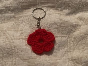Add a pop of handmade charm to your everyday essentials with this adorable crocheted flower keychain 🌺✨
Carefully handcrafted with soft, vibrant red yarn, this floral keyring features beautifully textured petals and a sturdy metal chain and ring for secure attachment to your keys, bag, or backpack. Its lightweight design makes it perfect for daily use while adding a sweet, personal touch to your accessories.
Each piece is lovingly made by hand, making every flower unique. Whether you&rsquo;re treating yourself or looking for a thoughtful small gift, this crochet flower keychain is a simple yet special way to brighten someone&rsquo;s day.