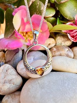 Trillion-cut Citrine&nbsp;Infinity Braid Celtic Sterling Silver Necklace&nbsp;
Metal: Sterling Silver&nbsp;
Gem: Genuine Citrine
Stone size: 5mm x 5mm
Birthstone: November