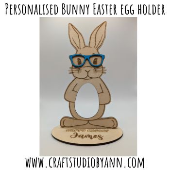 Adorable laser cut Easter Bunny egg holder designed to fit a standard Kinder Egg &ndash; and yes, the Kinder Egg is included! 🐰🥚
Perfect for Easter baskets, table gifts, or a sweet little surprise. Beautifully crafted in Ireland by CraftStudioByAnn. 💛