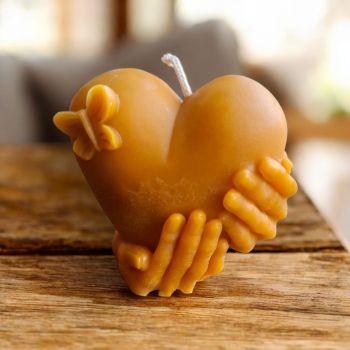 Made from 100% natural beeswax, this candle burns cleanly and slowly, offering up to&nbsp;40 hours of burn time. With its compact yet eye-catching size (75mm long x 80mm wide) and a weight of 128g, it&rsquo;s ideal for bedside tables, living spaces, or special occasions.