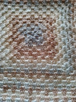 Beautiful Handmade crochet blanket in light brown and blue colours approx 70x70cms