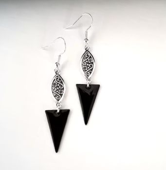Gorgeous antique silver tone earrings, handmade in Ireland with quality materials. Created with antique filigree connectors and triangular brass drops, beautifully enamelled in black.&nbsp; &nbsp; LIghtweight and comfortable to wear and perfect for day or evening wear... Great for gifting, or a treat for yourself!&nbsp;&nbsp;