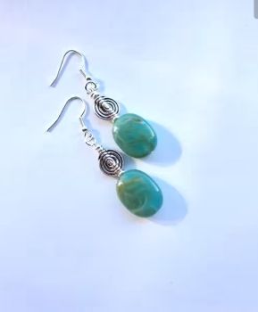 Beautiful spiral earrings, handmade in Ireland with quality materials.&nbsp; &nbsp;lightweight, comfortable to wear and bespoke.&nbsp; Elevate your look with these beauties...&nbsp; They arrive in a pretty velvet pouch, and have free shipping!