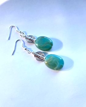 Beautiful spiral earrings, handmade in Ireland with quality materials.&nbsp; &nbsp;lightweight, comfortable to wear and bespoke.&nbsp; Elevate your look with these beauties...&nbsp; They arrive in a pretty velvet pouch, and have free shipping!