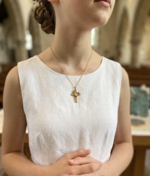 Gold plated cross necklace.