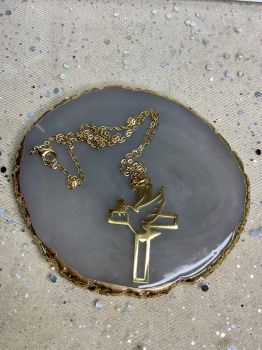 Gold plated cross necklace.