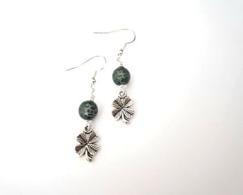 Handmade in Ireland, with quality materials, these gorgeous little earrings have antique silver tone four leaf clovers, silver plated beads and painted, marbled glass beads in deep green. They are lightweight, dainty and easy to wear .. Great for gifting, or a personal treat!&nbsp; They arrive in a pretty organza bag, and have free shipping!