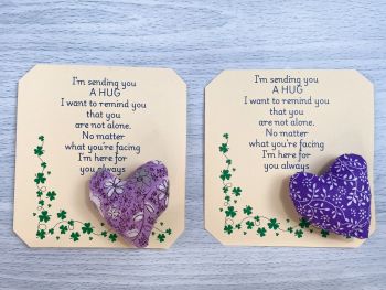 These are&nbsp; my sending you a hug fabric pocket hugs. This is my purple themed print set. Each pocket heart is handmade in a soft cotton fabric and filled to medium firmness. There is option to chose home grown dried lavender in your heart, at no extra cost.&nbsp;
Each pillow can vary slightly as each are handmade.&nbsp;
Each comes attached to a cream and shamrock patterned card to tell the person you are gifting them a hug. Each card measures 10cm X 10.5cm. It's blank on the back so you can write a message
* I am a breast cancer survivor myself so I understand how individuals undergoing cancer treatment just need a hug and sometimes you can't do that.&nbsp; &nbsp;