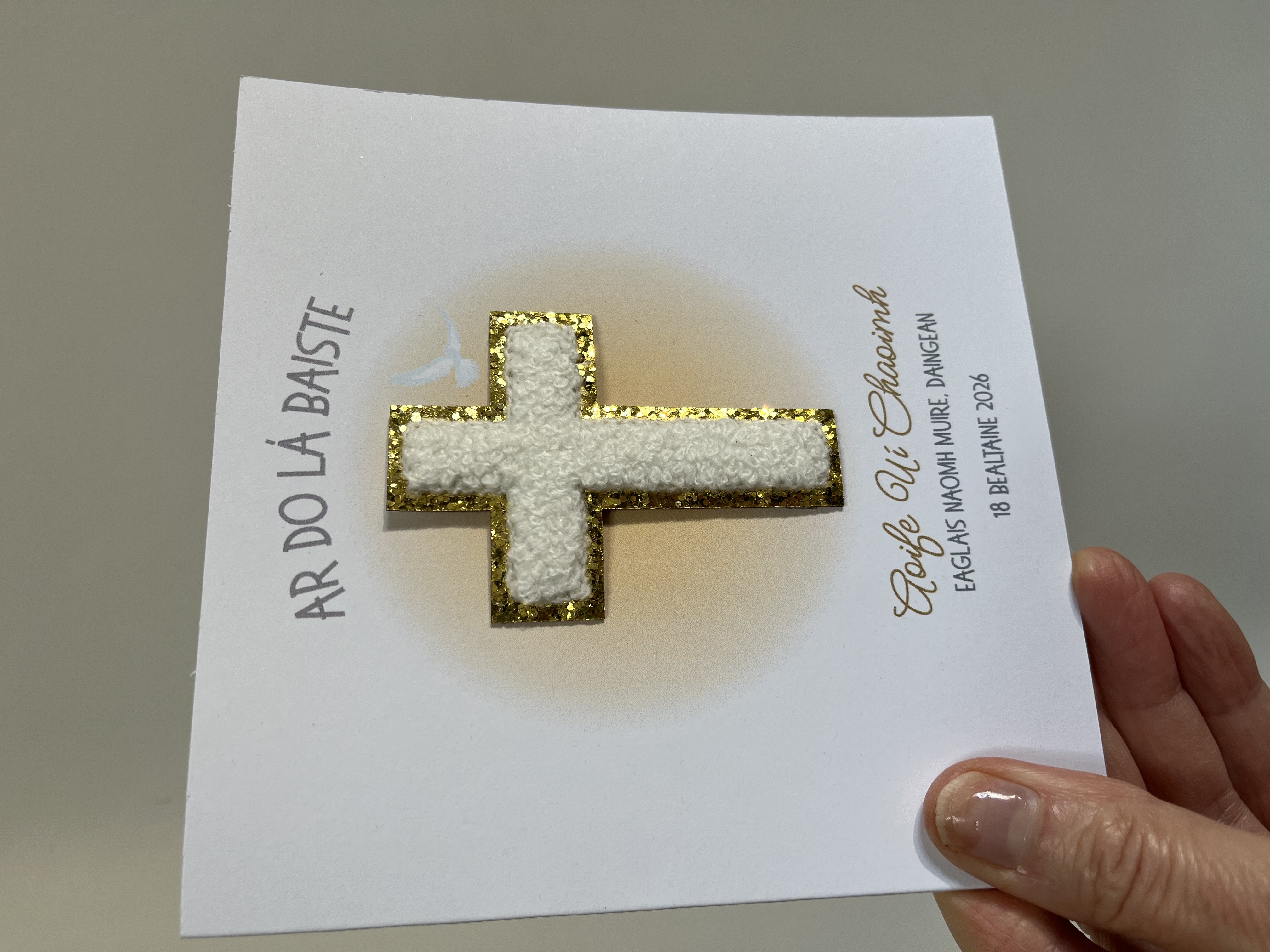 Celebrate a very special milestone with this beautiful&nbsp;ChristeningTrinket Card, designed to be treasured long after the day has passed. ✝️✨
This elegant card features a&nbsp;cross embellishment with a delicate glitter outline, finished with&nbsp;soft, fluffy material in a cross design&nbsp;that adds texture and a touch of warmth. A&nbsp;gentle dove in the background&nbsp;symbolises the Holy Spirit, creating a meaningful and faith-filled design perfect for the occasion.
The card is personalised with the&nbsp;recipient&rsquo;s name in gold print, along with the&nbsp;details of their special day, giving it a truly personal and memorable touch.
Available&nbsp;in both Irish and English, it&rsquo;s a thoughtful way to honour tradition while celebrating the significance of Confirmation. &nbsp;
More than just a card, this&nbsp;Trinket Card is designed to be framed and kept as a keepsake, making it a lasting reminder of a very important day. Make their Christening even more meaningful with a card that can be cherished for years to come.&nbsp;