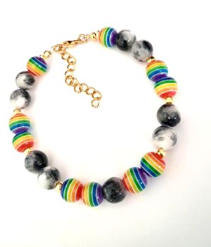 Beautiful multi coloured bracelet, handmade in Ireland with quality materials. Created with gold plated accents, acrylic beads and natural jasper stones.&nbsp; A gorgeous bespoke bracelet, easy to wear and great for gifting or a treat for yourself!&nbsp;