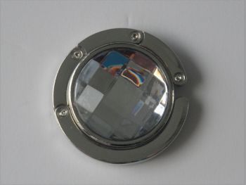 Handbag hooks are a functional accessory and very easy to use.
Perfect to keep your bag off the floor and allows you keep your bag in view at all times.