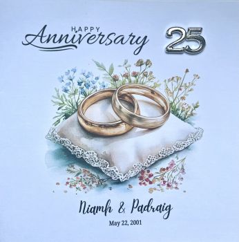 25th Silver Wedding Anniversary Card &ndash; Personalised Keepsake
Mark twenty-five years of love, laughter, and shared memories with this beautifully crafted silver wedding anniversary card. Designed in a classic 6x6 format, it is made from high-quality linen-textured card stock, offering a subtle, luxurious finish that feels as special as the occasion.
Each card is&nbsp;personally customised&nbsp;with the couple&rsquo;s names and wedding date, creating a meaningful keepsake to treasure for years to come.
A striking&nbsp;silver &ldquo;25&rdquo; embellishment&nbsp;adds a refined touch of shimmer and celebrating this remarkable milestone in timeless style.
Simple, elegant, and thoughtfully made, this card is perfect not only for gifting but also for&nbsp;framing as a lasting reminder&nbsp;of a beautiful journey together.
Features:

6x6 inch square card
Premium linen-textured card stock
Personalised with names and wedding date
Silver &ldquo;25&rdquo; embellishment detail
Elegant, timeless design suitable for framing

A graceful tribute to 25 years of enduring love. 💍✨