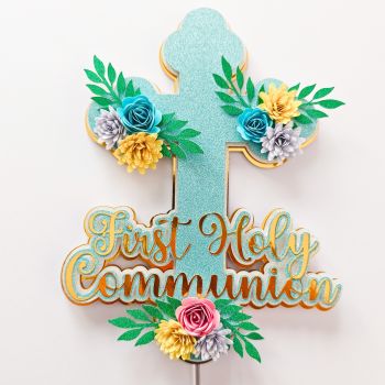 A Keepsake as Special as the Day Itself
Mark this sacred milestone with a handcrafted cake topper that truly stands out. Featuring a glitter cross, layered paper flowers in soft blues, pinks, yellows, and lilac, and elegant gold-script&nbsp;First Holy Communion lettering &mdash; this topper transforms any celebration cake into a centrepiece worth remembering.