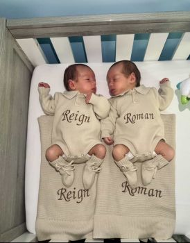 3 piece cosy knit baby set includes&nbsp; collar romper , solid edge blanket , and booties .
Name is embroidered on romper and blanket&nbsp;