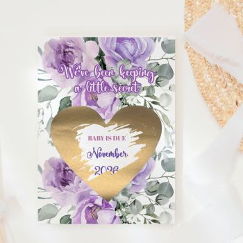 We've Been Keeping a Little Secret 💜🌿
Lush purple peonies and soft eucalyptus branches cascade across every inch of this card in rich, full-bleed watercolour, this is the most dramatic and beautiful way to share your pregnancy news. They read "We've Been Keeping a Little Secret", pick up a coin, and scratch away the gold heart to discover your baby's due date. That gasp of pure, breathless joy, handmade in Ireland by Printarelle.

What sets this design apart is the full-bleed botanical print, oversized purple peonies, violet blooms, and layered eucalyptus leaves fill the entire card edge to edge, with the gold heart scratch panel sitting boldly at the centre. Lush, dramatic, and utterly unforgettable. A world apart from the white-background lilac rose version.