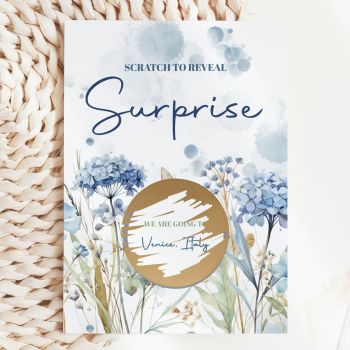 The Most Exciting Way to Reveal a Trip ✂️🌿
Picture their face as they read "Scratch to Reveal Surprise", pick up a coin, and scratch away the gold circle to discover where you're whisking them off to. Our Personalised Holiday Surprise Scratch Card turns a travel announcement into a moment of pure, breathless excitement, handmade in Ireland by Printarelle.

Featuring a dreamy watercolour botanical design with dusty blue hydrangeas, agapanthus, wild grasses, and soft watercolour ink splashes in navy and slate blue. Elegant, romantic, and utterly beautiful, the perfect frame for your big travel reveal.