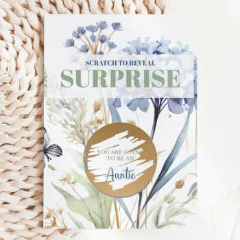 She'll Never Forget This Moment 🦋🌿
Soft sage greens, dusty blue hydrangeas, delicate wildflowers, and a butterfly drifting across the card, this is the most beautiful way to tell your sister or best friend she's going to be an auntie. She reads "Scratch to Reveal Surprise", picks up a coin, and scratches away the gold circle to discover: "You Are Going to Be an Auntie." That moment of pure, breathless joy, handmade in Ireland by Printarelle.

Featuring a dreamy watercolour botanical design with blue hydrangeas, agapanthus, wild grasses, and a delicate butterfly in sage and dusty blue tones. Serene, elegant, and utterly unforgettable.