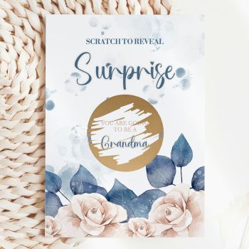 The Most Beautiful Way to Tell Her 🌹🤍
Imagine placing this gorgeous card in her hands, your mum, your mother-in-law, the woman who is about to become a grandma for the very first time (or again!). She reads the words "Scratch to Reveal Surprise", picks up a coin, and scratches away the gold circle to discover: "You Are Going to Be a Grandma." That moment of pure, overwhelming joy, captured in a card handmade in Ireland by Printarelle.

Featuring a stunning watercolour design of blush roses and deep navy eucalyptus leaves against a soft watercolour wash, with elegant script typography. Timeless, romantic, and utterly unforgettable.