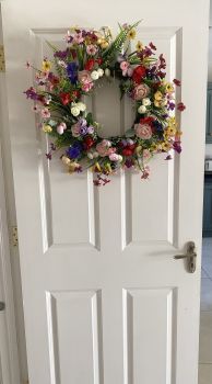 Summer Meadow Wreath
A vibrant, handcrafted wreath inspired by a blooming summer meadow Filled with soft roses, colourful wildflowers, and natural greenery, it brings instant life and warmth to any space.
Each piece is handmade and completely unique, with a full, textured design that stands out beautifully on your front door or indoors.

Handmade with high-quality artificial florals
Lightweight and easy to hang
Suitable for indoor or sheltered outdoor use
One of a kind

Limited availability &mdash;