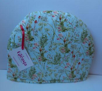 Keep your teapot warm with our fun and functional tea cosy.
Floral&nbsp; print. Handmade by Gl&eacute;asta.
100% cotton with polyester filling.
Matching Cafetiere cosy available.
DIMENSIONS: 28cm x 34cm.