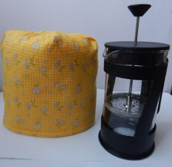 Keep your coffee warm with our cafetiere/french press cosy.
The cosy fits a standard 8 cup cafetiere 12" x 7" high / 31cms x 18cms high.
Matching tea cosy available.