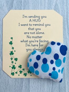These are&nbsp; my sending you a hug fabric pocket hugs. This is my blue spots print. Each pocket heart is handmade in a soft cotton fabric and filled to medium firmness. There is option to chose home grown dried lavender in your heart, at no extra cost.&nbsp;
Each pillow can vary slightly as each are handmade.&nbsp;
Each comes attached to a cream and shamrock patterned card to tell the person you are gifting them a hug. Each card measures 10cm X 10.5cm. It's blank on the back so you can write a message
* I am a breast cancer survivor myself so I understand how individuals undergoing cancer treatment just need a hug and sometimes you can't do that.&nbsp; &nbsp;