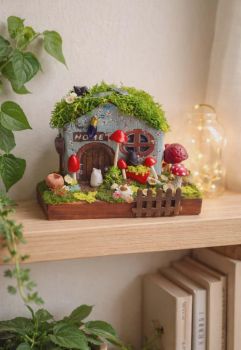Handcrafted wooden cottage with preserved moss roof and tiny mushrooms, painted with acrylic colours! 11/15/9 cm!