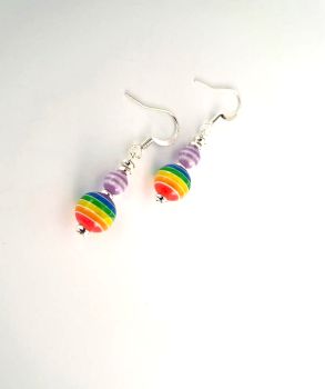 Gorgeous rainbow earrings, handmade in Ireland with quality materials, Light and easy to wear, bespoke and dainty. They arrive in a pretty organza bag, and have free shipping!