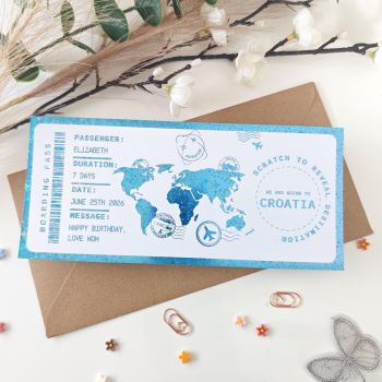 The destination is a secret &mdash; until they scratch to reveal it.

This personalised scratch-to-reveal travel boarding pass is finished with a stunning blue holographic foil that shimmers with an icy, star-speckled shimmer at every angle. Hand-finished in Mallow, Cork, Ireland, it features a world map illustration in shifting blue tones, travel stamps, and a hidden destination circle &mdash; covered with a scratch panel so the recipient discovers where they're going in the most magical way possible. It's not just a gift. It's a moment.