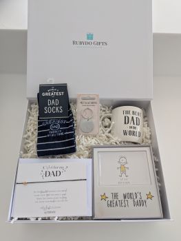 Treat him to something he&rsquo;ll actually use and appreciate with our Father&rsquo;s Day Gift Box for Dad &ndash; a thoughtful mix of practical and meaningful keepsakes, all in one ready-to-gift set.
&nbsp;
Carefully put together to make gifting easy, this box is perfect for showing your appreciation and giving him a few little reminders of how much he means.
&nbsp;
Inside, he&rsquo;ll find:
&bull; Comfortable Socks &ndash; a classic dad favourite
&bull; Daddy Photo Frame &ndash; perfect for a special memory
&bull; Dad Mug &ndash; for his daily tea or coffee
&bull; Dad Keyring &ndash; a simple keepsake he can carry every day
&bull; Dad Wish String &ndash; a thoughtful token with a meaningful message
&nbsp;
Whether it&rsquo;s from a son, daughter or the whole family, this Father&rsquo;s Day Gift Box is a lovely way to say thanks for everything he does &ndash; with a mix of useful gifts and sentimental touches he&rsquo;ll genuinely enjoy.