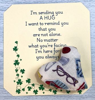 These are&nbsp; my sending you a hug fabric pocket hugs. This is my sewing items print. Each pocket heart is handmade in a soft cotton fabric and filled to medium firmness. There is option to chose home grown dried lavender in your heart, at no extra cost.&nbsp;
Each pillow can vary slightly as each are handmade.&nbsp;
Each comes attached to a cream and shamrock patterned card to tell the person you are gifting them a hug. Each card measures 10cm X 10.5cm. It's blank on the back so you can write a message
* I am a breast cancer survivor myself so I understand how individuals undergoing cancer treatment just need a hug and sometimes you can't do that.&nbsp; &nbsp;