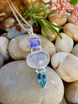 Handmade Sterling Silver Pendant Necklace decorated with multi gemstones
Metal: Sterling Silver
Gem: Rainbow Moonstone, Brazilian Amethyst, Blue Topaz
Pendant Size: 40mm x 15mm