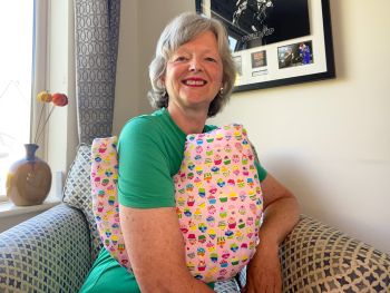 My breast cancer surgery support pillows are ideal for use directly after surgery, or in the following weeks while healing takes place. This support pillow is shaped to fit comfortably under the affected arm, and is filled with high quality polyester filling to a fairly firm finish, perfect to provide adequate support and comfort. This pillow reaches mid chest in width, so it will easily cover the surgery area, and provide support&nbsp; and padding.
It measures 43cm wide X 37cm long and 10 cm in depth. This dachshunds in jumpers fabric is soft and breathable. All pillows come with a handmade with love by Rodgerson Handcraft label and are reversible.
