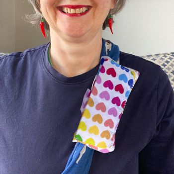 These are chemotherapy port support pillows made using soft cotton fabric. Each pillow is filled to medium firmness for comfort. There is a large flap with two sets of velcro fastenings. The velcro will enable to the pillow to be attached to a chosen area.&nbsp;&nbsp;
Each pillow can vary slightly as each are handmade. I've used this multi-colourful love hearts print&nbsp;print for these pillows. I&rsquo;ve added a handmade with love by Rodgersonhandcraft tag too.
This support pillow is ideal for use directly after chemotherapy, or if the area feels tender.&nbsp;