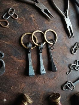 100% Hand-Forged:&nbsp; &nbsp; &nbsp;Individually crafted on the anvil by blacksmith Ben Cronin in County Kerry.
The Story:&nbsp; &nbsp; Inspired by the historic "Emigrant's Nail" carried by those leaving Irish shores.
Built to Last:&nbsp; &nbsp; Rugged traditional iron finish with a protective beeswax coating
