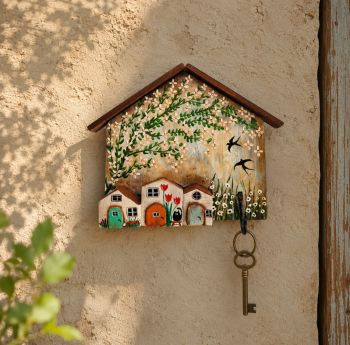 One-of-a-kind handcrafted wooden key holder, perfect for every hallway or for a special gift.