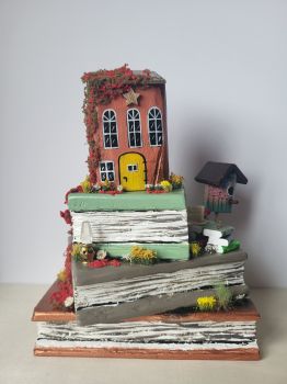 Handcrafted wooden books made from reclaimed wood, painted with acrylic colours and varnish. Perfect for any spaces or for a special gift.