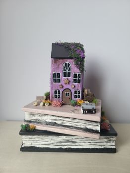 One-of-a-kind handcrafted wooden book stack,hand-painted with acrylic colour and carefully decorated, is perfect for any room!