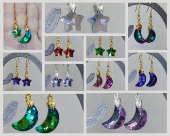 Add a touch of celestial sparkle to your look with these beautiful crescent moon and/or star dangle earrings.&nbsp;
Designed with shimmering rhinestone-style charms, these earrings capture the magic of the night sky with their elegant and eye-catching shapes.
Each pair is carefully handmade, combining lightweight materials with dazzling details to create a stylish yet comfortable accessory. The moon and star design makes them perfect for both everyday wear and special occasions, adding a dreamy and cosmic feel to any outfit.
✨Allow for some color difference