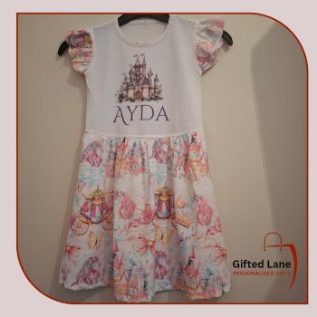 Make every little girl&rsquo;s fairytale dreams come true with our Fairytale Dress now available from Gifted Lane. Featuring a soft white bodice which can be personalised with any picture or text on it and a whimsical pastel print skirt with unicorns, castles, and butterflies, this dress is ideal for birthdays, boutique collections, princess parties, and personalized gifts. Another special personalised gift from Gifted Lane.