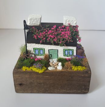 Unique handcrafted miniature Irish cottage made from reclaimed wood and painted with acrylic colour! 9/7/8 cm is perfect for any shelf, desk, or mantel!