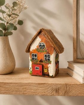 One-of-a-kind handcrafted miniature cottage hand-painted to each side, special for any gift!