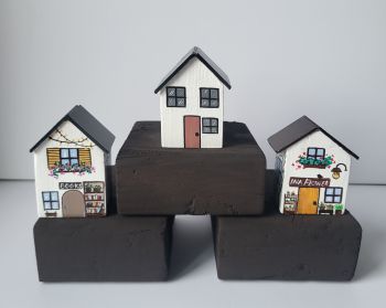 Beautiful tiny wooden houses, handcrafted from reclaimed wood and hand-painted with acrylic on each side, are perfect for any shelf or for a special gift!