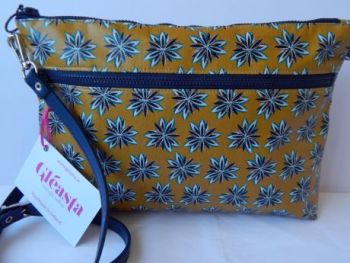 One of a kind double zippered crossbody bag made from
mustard wipe clean coated cotton with a navy design.
Handmade in Ireland. Only one produced.